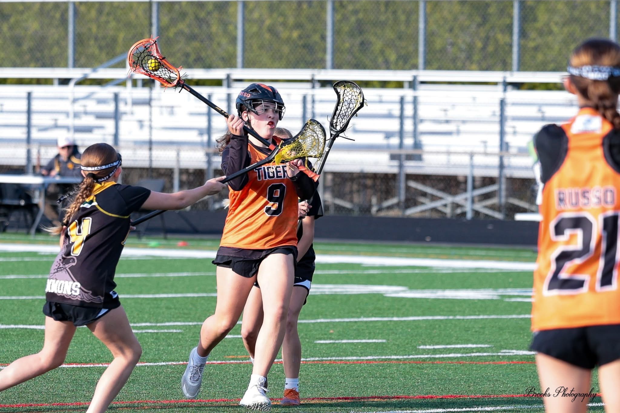Bella Rosso lacrosse action